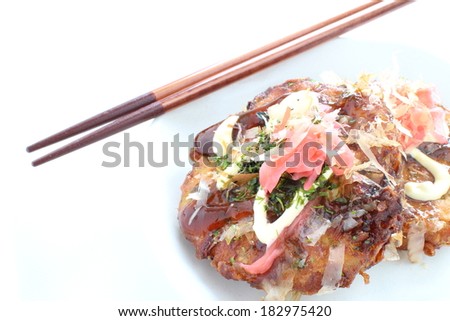 Osaka soul food, Okonomiyaki Cabbage pan cake with mayonnaise sauce and beni shoga on top