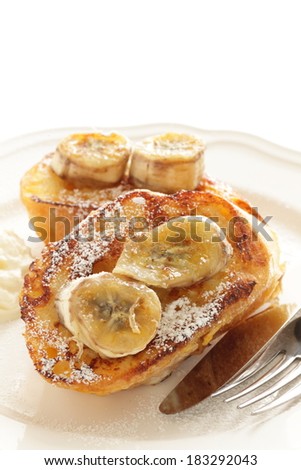 Pan fried banana on honey french toast for gourmet dessert image