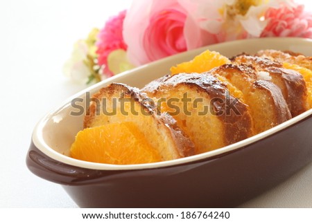 Homemade bread pudding, baked orange and bread with white background
