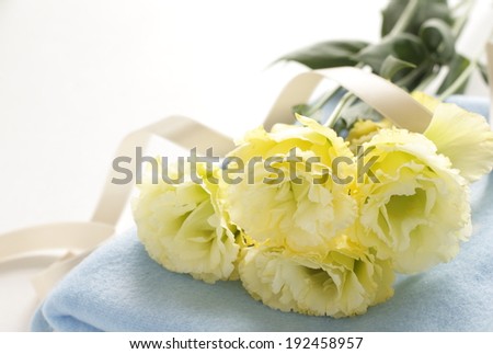 Yellow bell flower on new water blue blanket