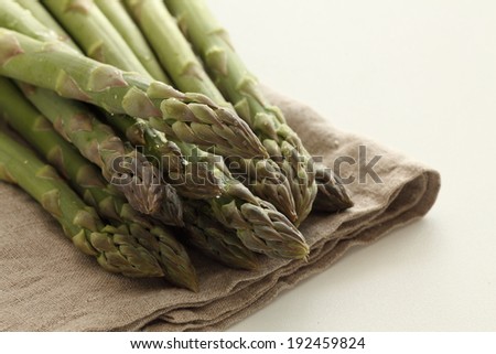 freshness asparagus from Japan close up on linen napkin with copy space