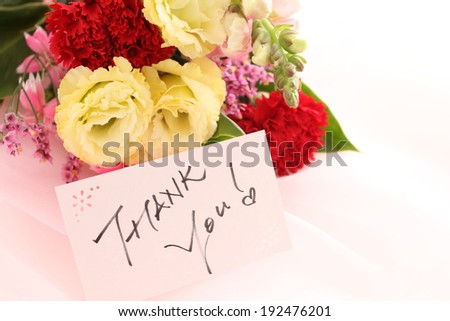 Hand written Thank you card and carnation bouquet for Mother\'s day image