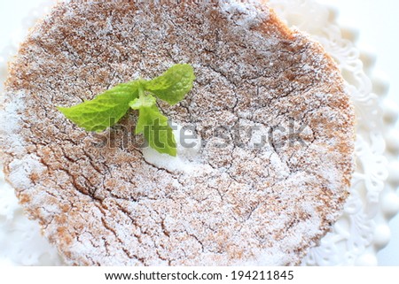 Home bakery, Chiffon cake with mint on top for gourmet dessert image
