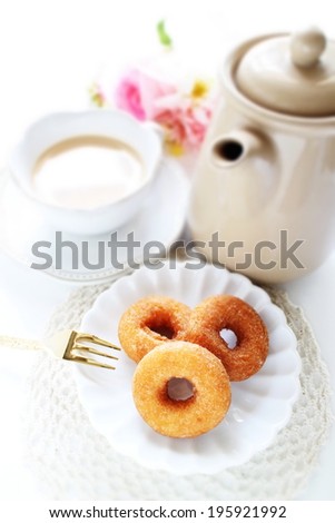 sugar donut and milk tea in diorama stye