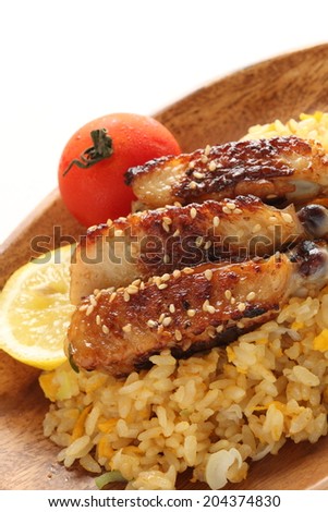 Asian food, fried rice with spicy chicken wing