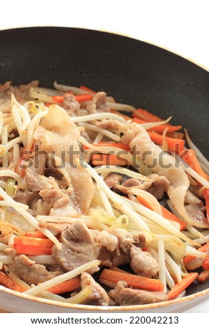 chinese cooking, pork and soy bean stir fry