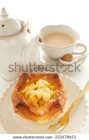 home bakery, corn and mayonnaise pie with royal milk tea on background