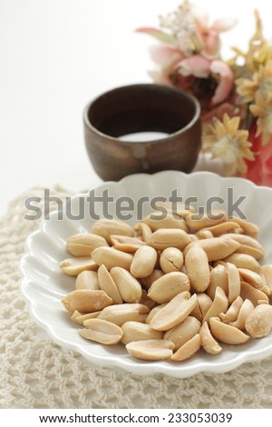 asian snack food, peanut and Japanese Sake