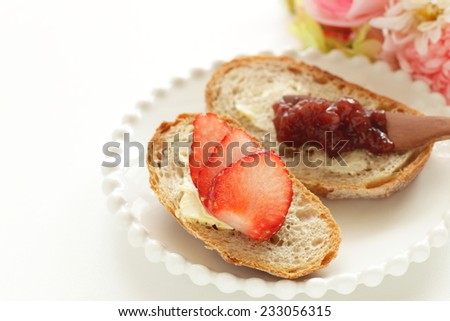 Strawberry on french bread for preparing jam and fruit sandwich