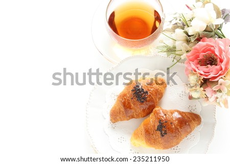 Sesame Croissant and English tea for gourmet breakfast image