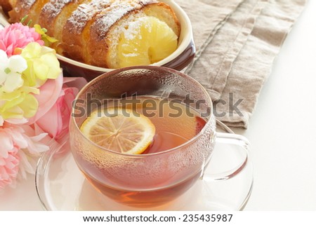 Lemon tea and bread pudding