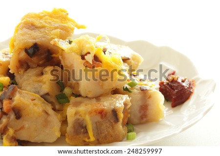 Chinese new year food, egg stir fried with turnip cake
