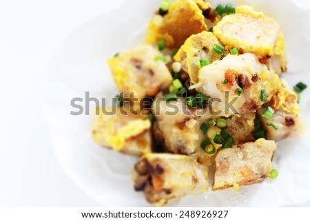 Chinese new year food, fried turnip cake with egg