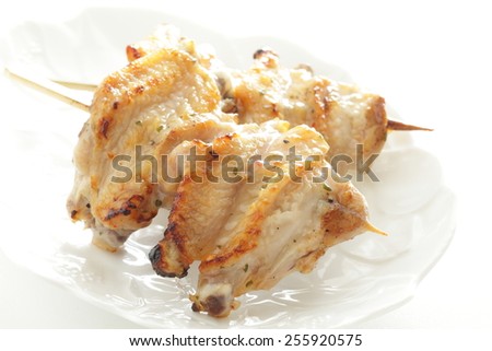 Japanese food, Chicken wing Yakitori on white dish