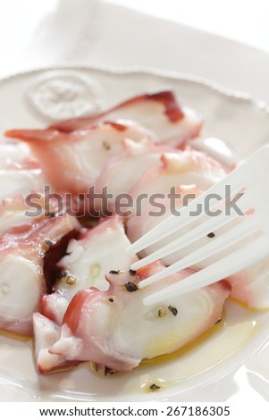 Italian and Japanese fusion food, boiled octopus Carpaccio