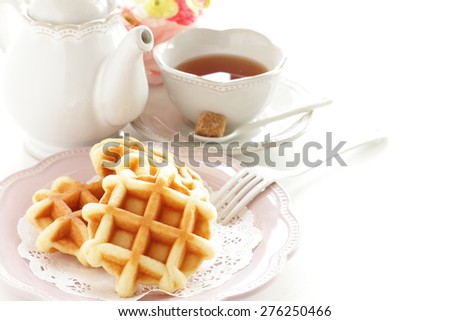 homemade waffle and English tea for gourmet breakfast image