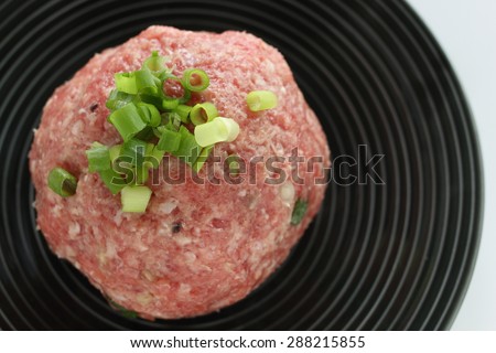 Chinese cooking, mince and spring onion meat ball