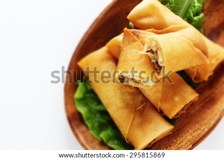 Chinese food, half section spring roll on lettuce