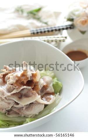 Japanese salad, boiled pork slices with a sesame dressing. Healthy and light. Reishabu.