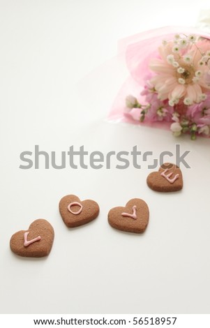 A bouquet  with LOVE cookies with copy space for your message
