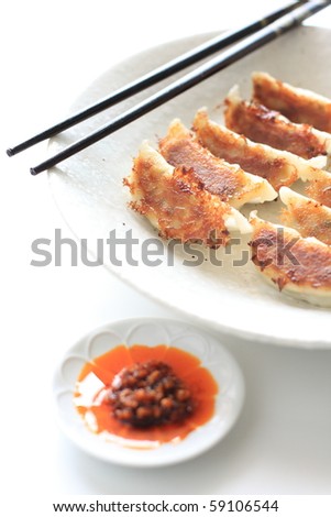 Chinese cuisine, Gyoza with Japanese  spicy hot sauce