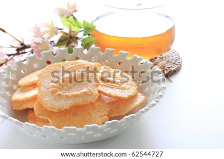 Japanese snack food, shrimp chips styling with tea and flower