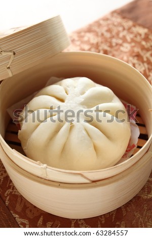 Chinese breakfast, steamed bun in bamboo steamer