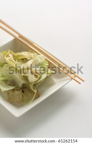 Healthy Chinese boiled lettuce with soy sauce and sesame oil
