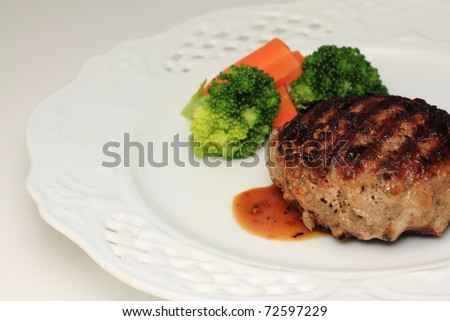 Hamburger steak with freshess broccoli and carrot