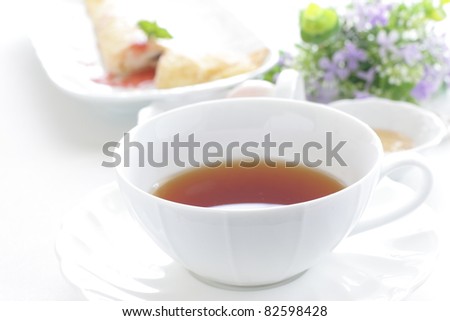 English tea with dessert and flower on background