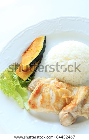 One plate menu, chicken and garlic sauteed with grilled pumpkin served with rice