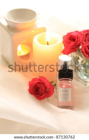 Pink roses and aroma oil for beauty and health lifestyle image