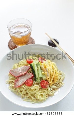 Chinese cuisine, summer cold noodles with vegetable and roasted prk