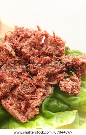Corned beef and lettuce on bread