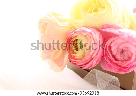 Beautiful buttercup flowers in gift box