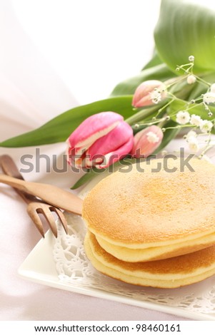 Pan cake and tulip for spring food image