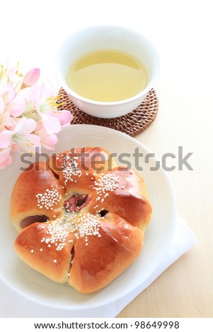 Japanese red bean bread with edible flower Cherry blossom for spring food image