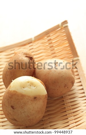 spring vegetable, boiled potato on japanese bamboo basket