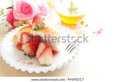 Freshness strawberry and crape cake with english tea for afternoon tea image