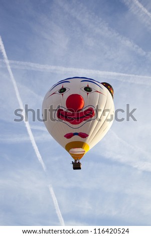 BARNEVELD, THE NETHERLANDS - 17 AUGUST 2012: Colorful clown balloon taking off at international balloon festival Ballonfiesta in Barneveld on August 17 2012 in Barneveld, The Netherlands