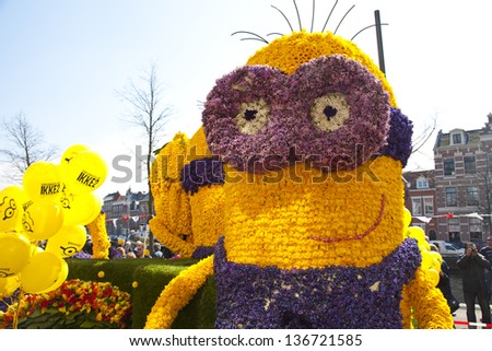 HAARLEM, THE NETHERLANDS - APRIL 21 2013: Despicable character with flowers at flower parade on April 21 2013 in Haarlem, The Netherlands. The flower parade is a event with one million visitors.