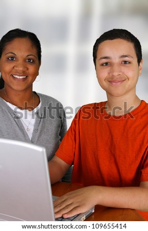 Teacher with her student in a classroom