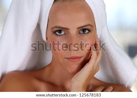 Woman wrapped in a towel while at spa