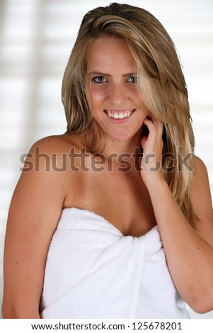 Woman wrapped in a towel while at spa