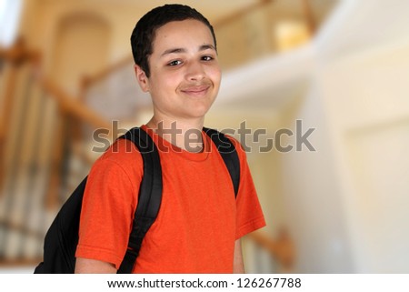 Teen boy getting ready to go to school