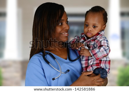 Minority nurse working at her job in a hospital with family