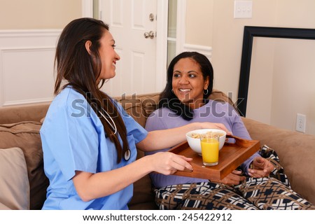Home health care worker and an adult woman