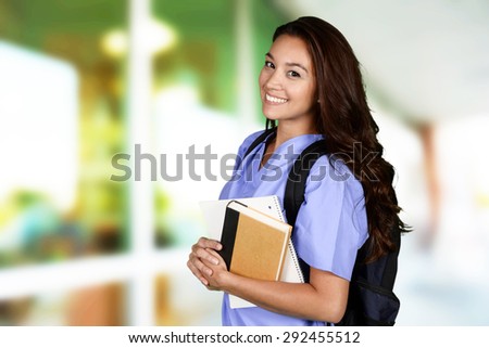 Female nurse who is studying for her job