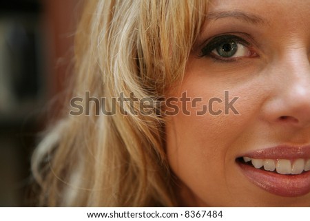 One side of a womans face from an up close perspective