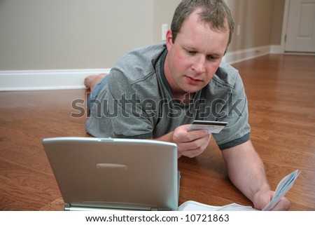 Man paying bills on the computer